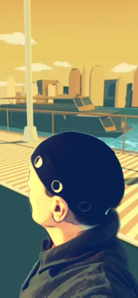 Man wearing the Moon Hat in slouch style. The hat is loosely bunched and then pulled backward to give a relaxed ring of Moon phase images that are carried above the ear.