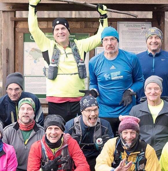 Sunday Runs ROHV — Rob with group of trail runners wearing Moon Hat