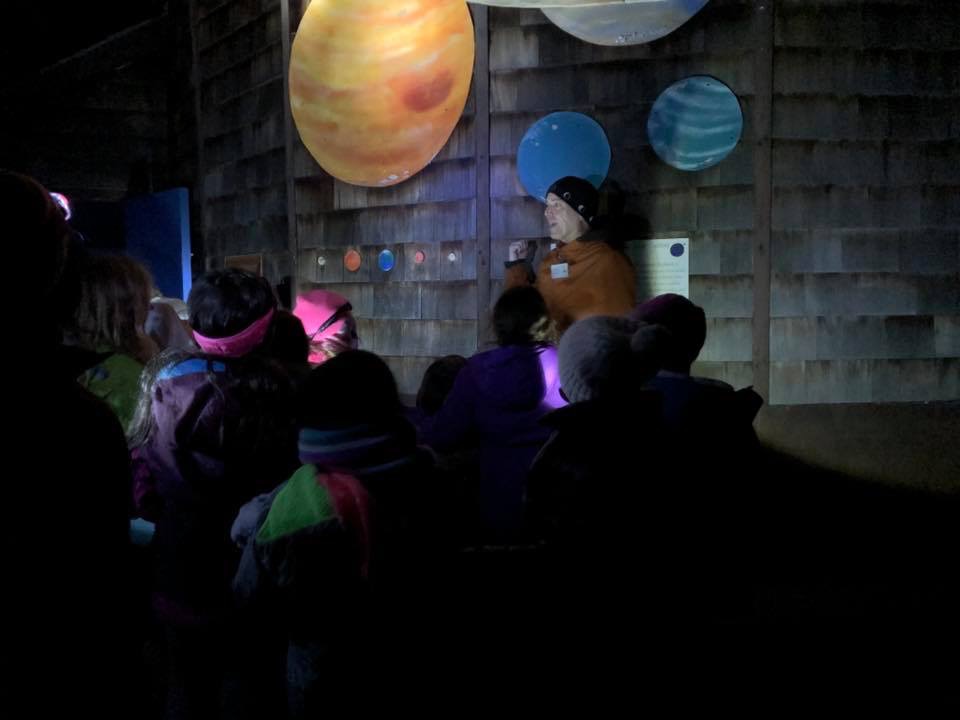 Daniel Cummings with Croton Girl Scouts at Sharpe Reservation planetarium
