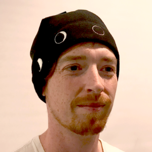 Man modeling Moon Hat inside