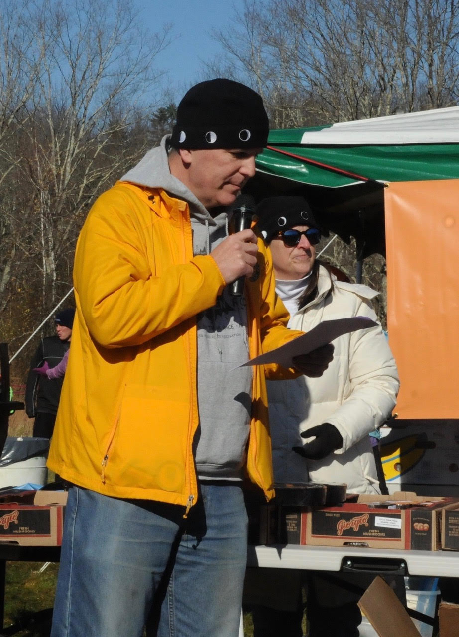 Robert Cummings and Ciorsdan Conran with microphone wearing Moon Hats at Raven Rocks Run