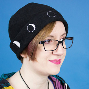 Woman wearing Moon Hat — TeacherSource