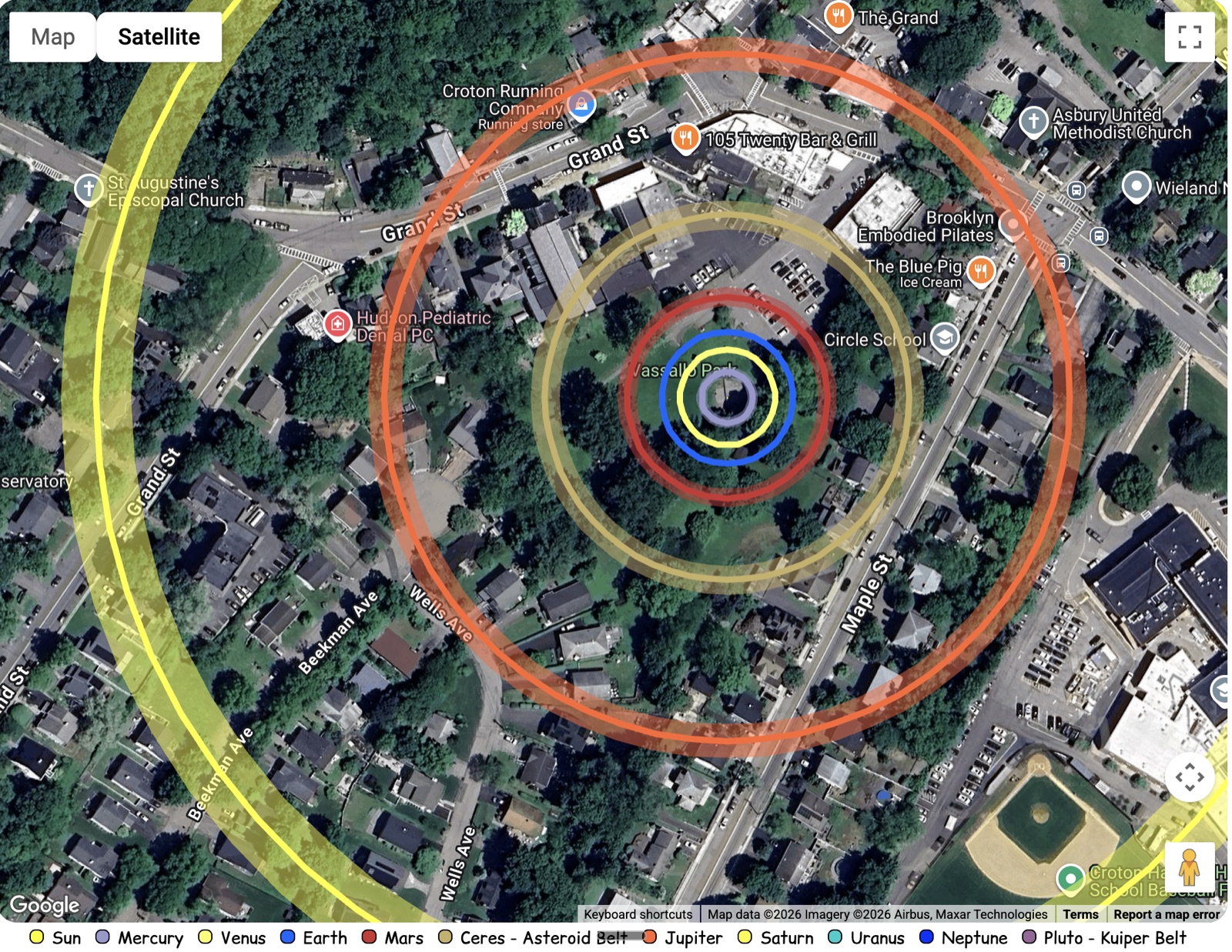 Orbit rings of Jupiter and Saturn drawn over the village center of Croton-on-Hudson
