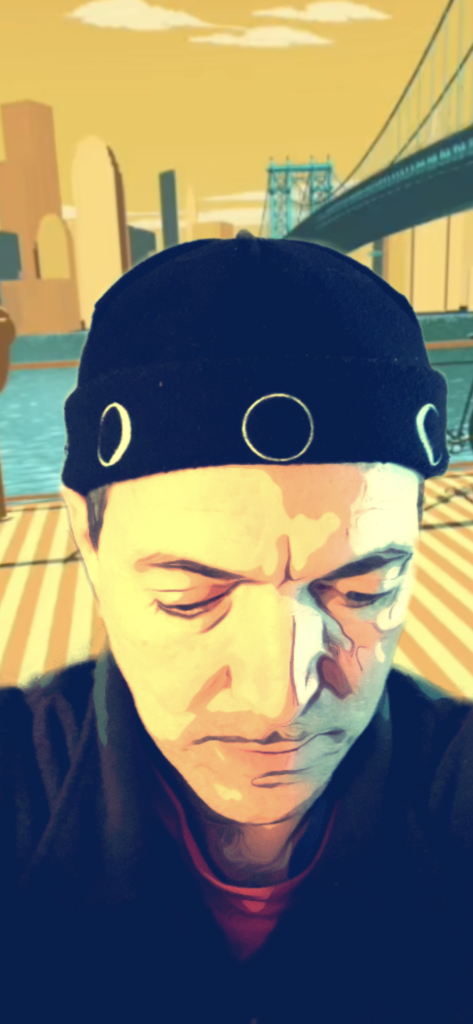 The Moon Hat style the Tidal Shore No Tag - the hat starts inside out and the brim is folded up to reveal the images. This is another standard style for wearing the Moon hat. The New Moon image is oriented to the front and you can face the Sun and find the Moon using the Moon Hat New Moon phase image.